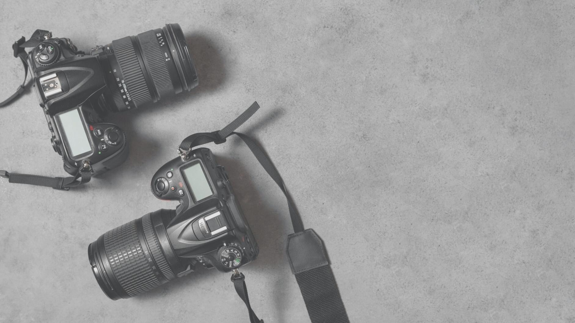 Professional editing workspace with multiple monitors and editing equipment